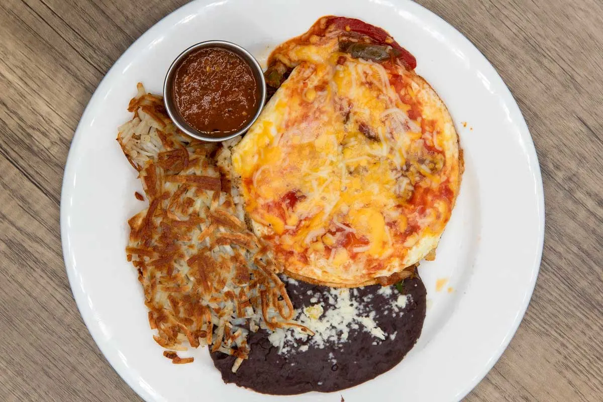 Hashbrowns-huevos-rancheros-eaten-for-breakfast-in-Cabo San Lucas Mexico