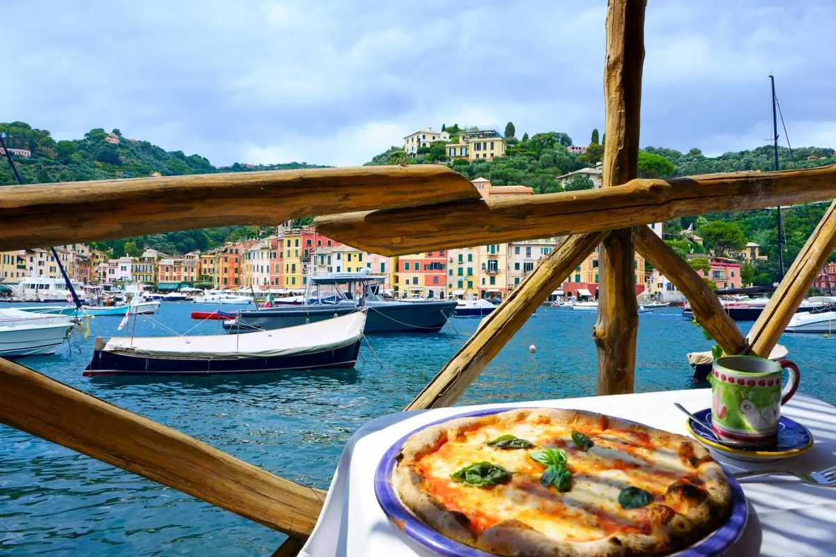 Lunch overlooking Portofino harbor on a tour from Genoa Italy