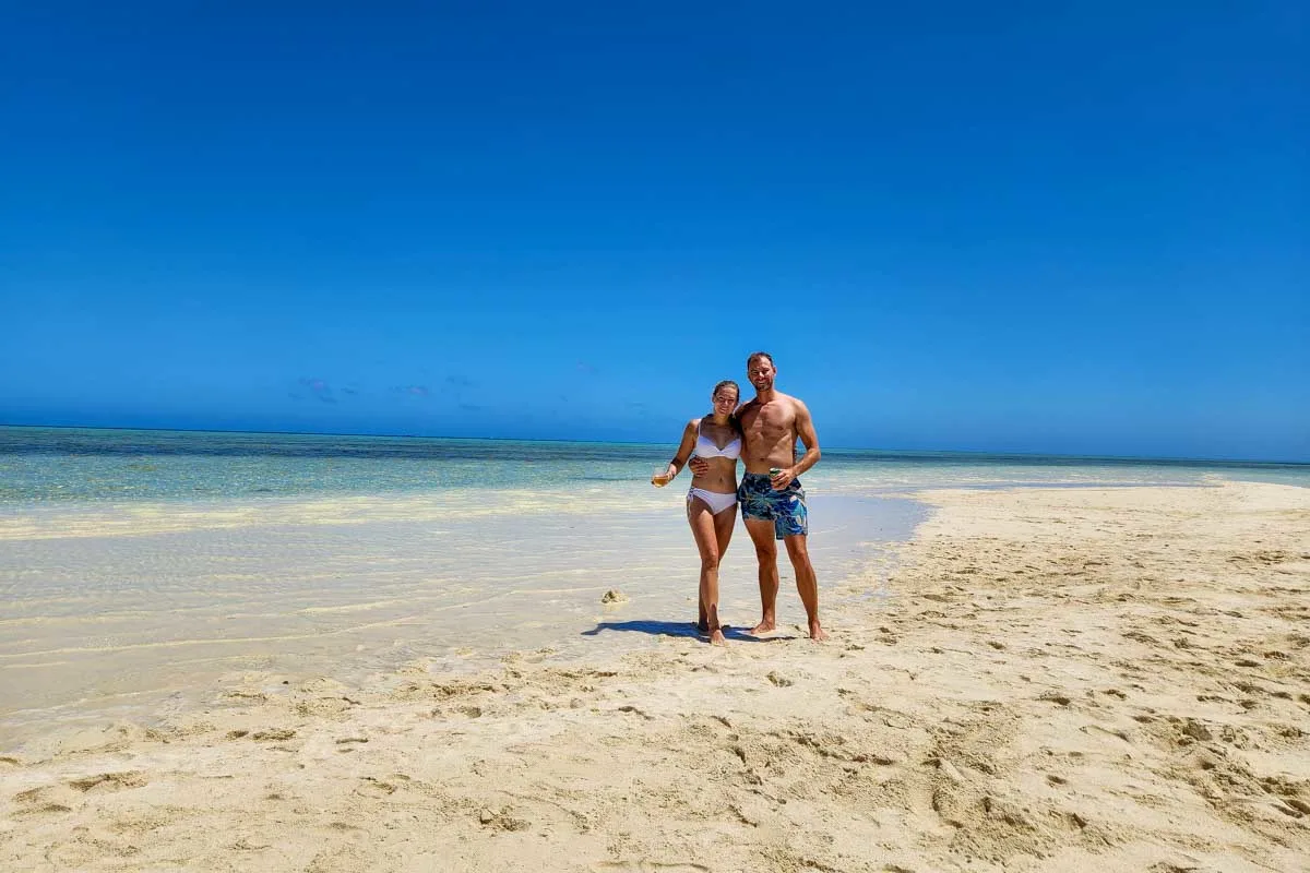 Bailey-and-Daniel-posing-for-a-picture-on-a-the-beach-in the San Blas Islands near Panama City Panama