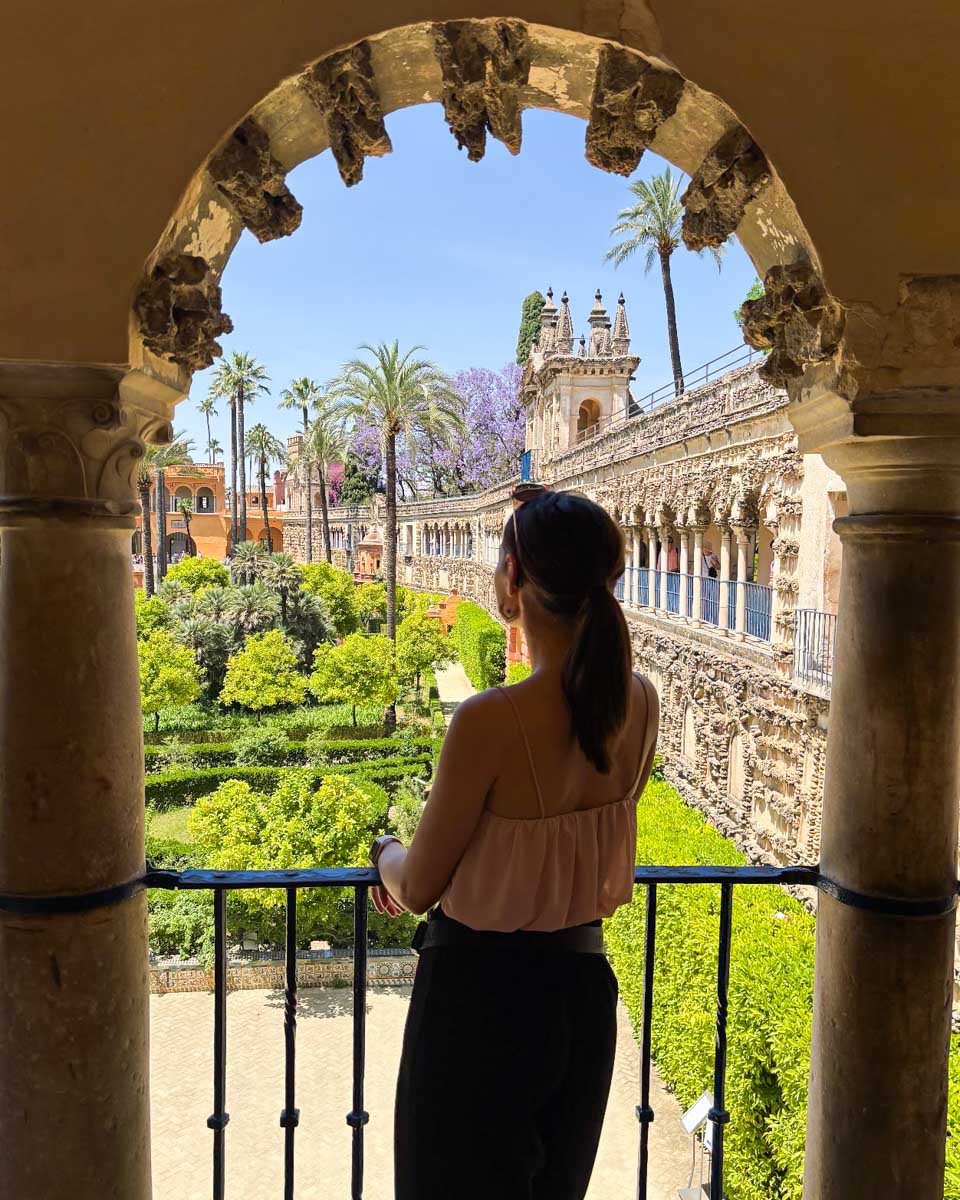 Brittni looks out over the Royal Alcazar of Seville in Spain