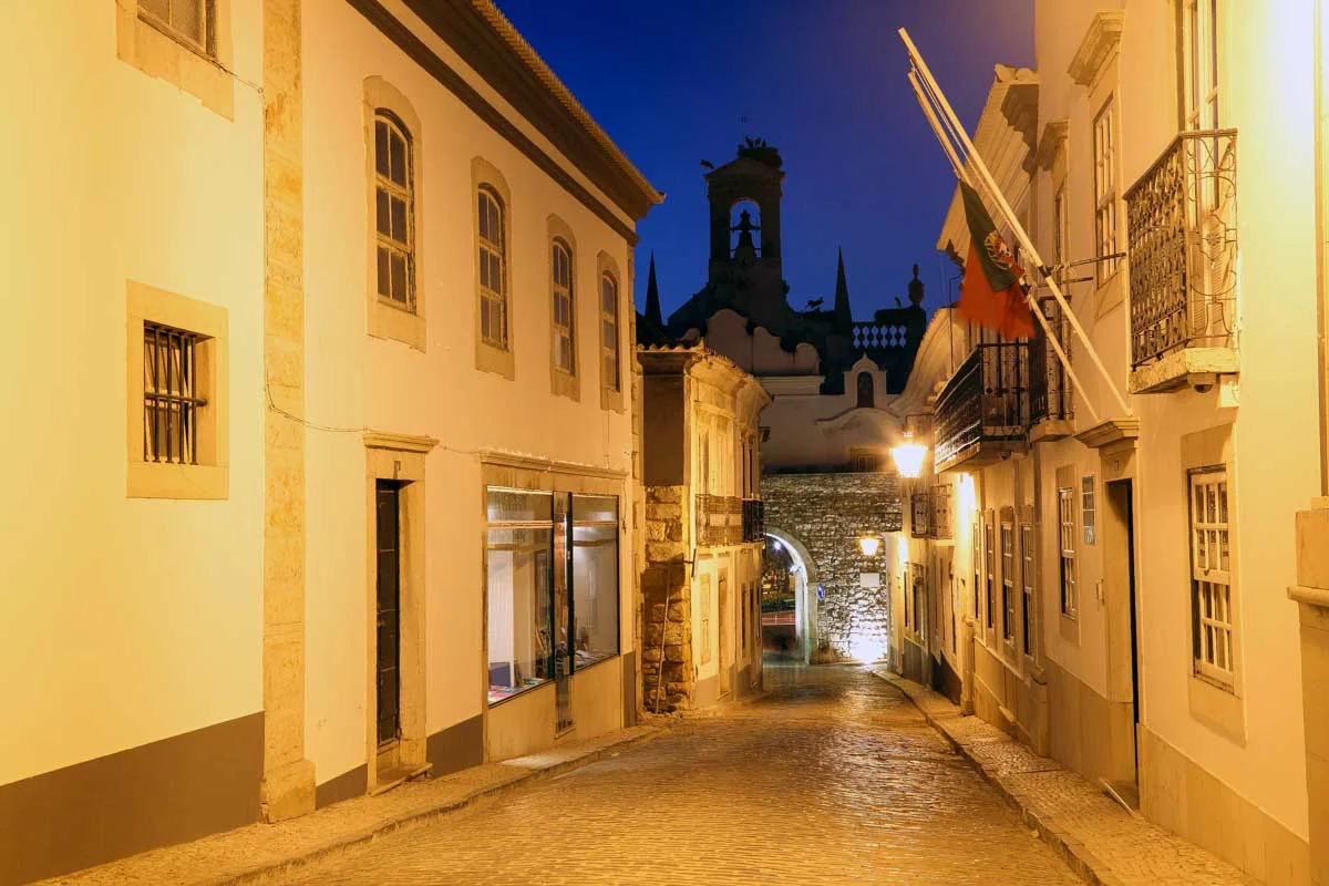 Street at night in the old town of Faro, Portugal