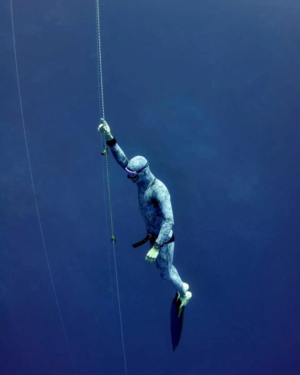 A man freedives in Bohol Philippines