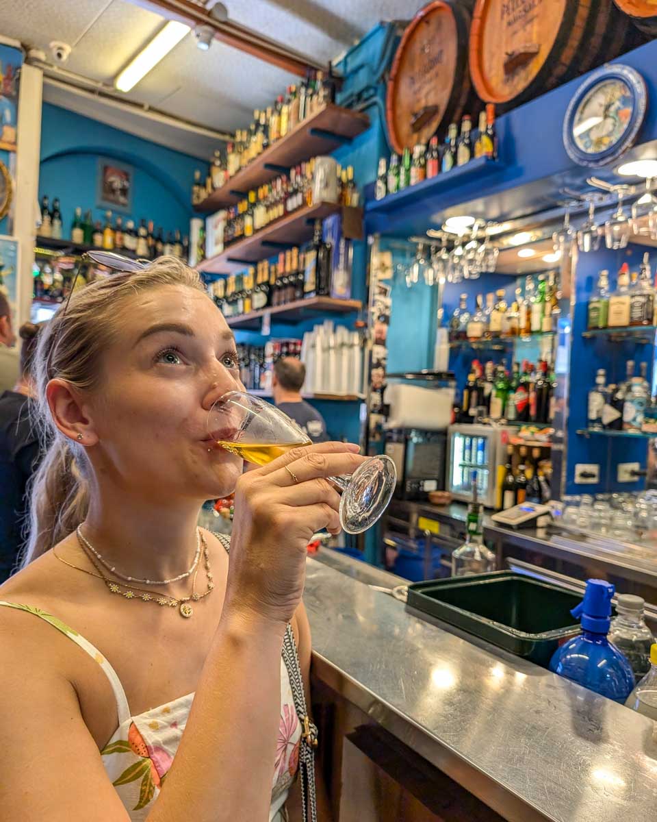 Bailey-drinks-wine-on-a-food-tour-in-Malaga-Spain