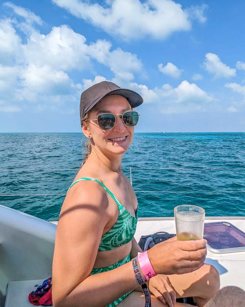Bailey enjoys a rum punch after snorkeling in Bonaire