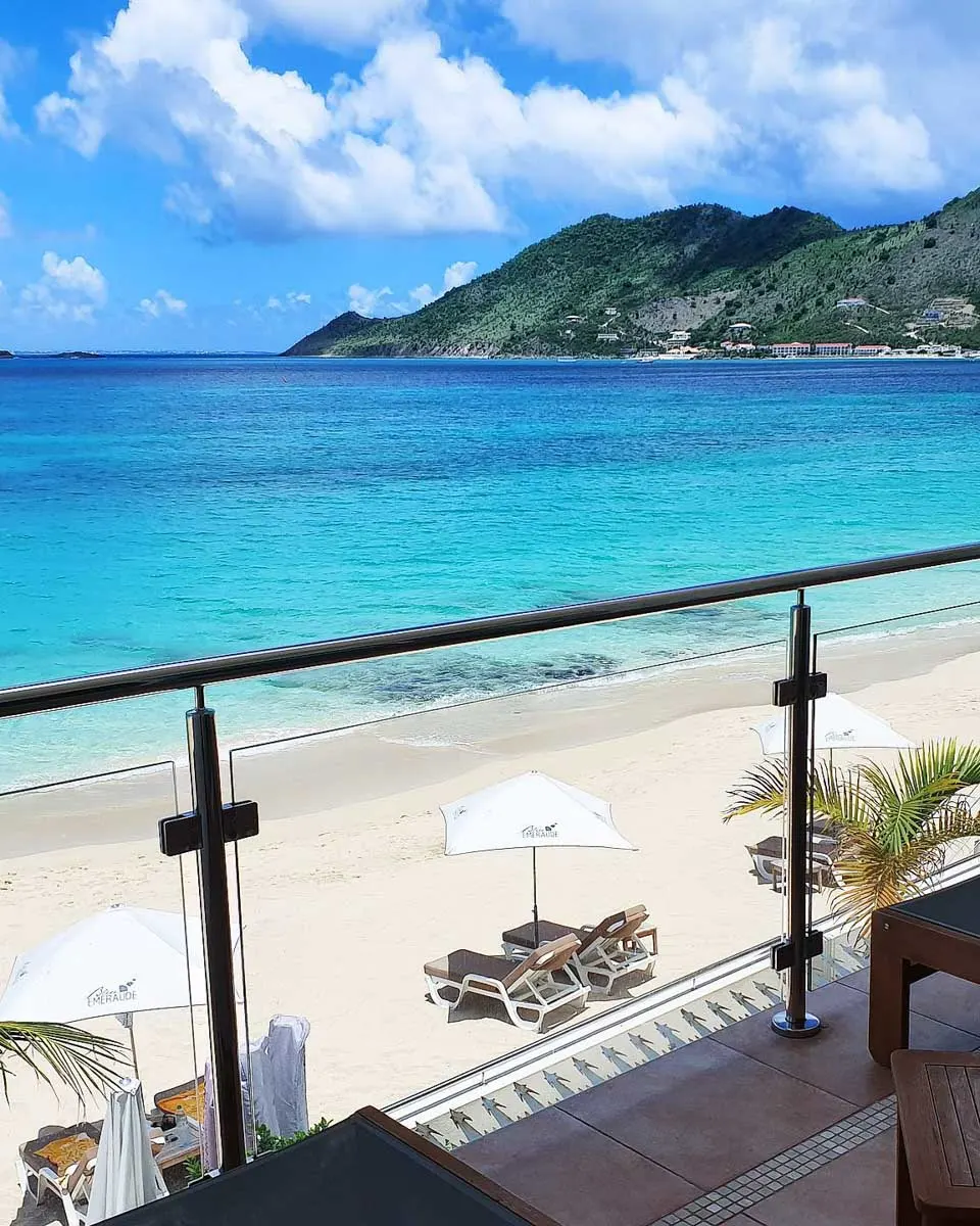 Balcony overlooking the beach and ocean at Bleu Emeraude Hotel