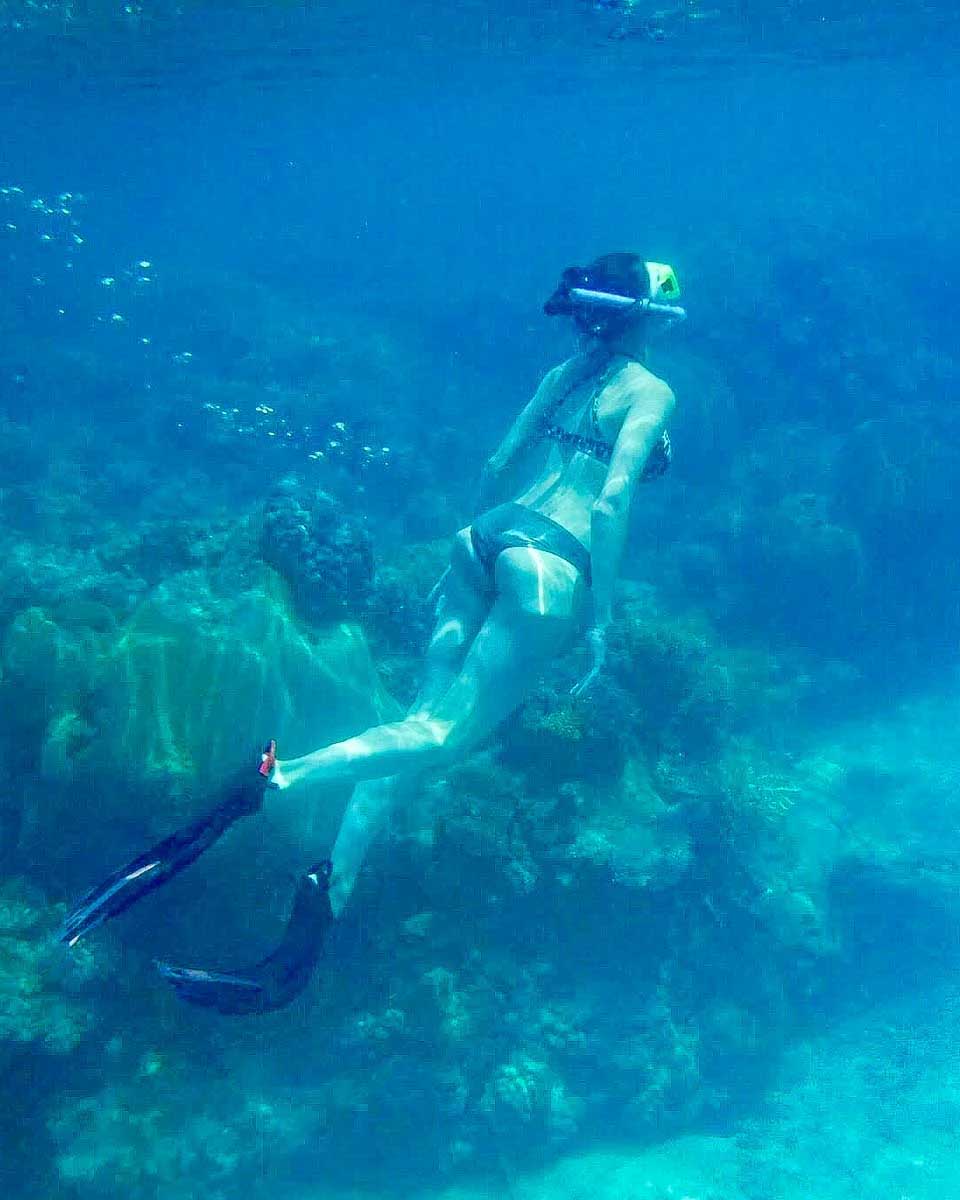 A-woman-snorkels-during-a-tour in Bora Bora