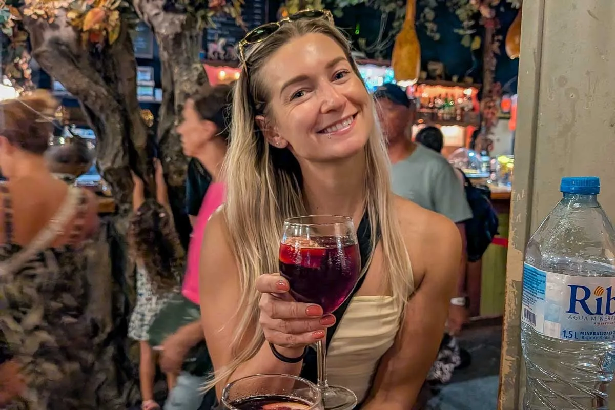 Bailey drinks a cocktail in Pisa Italy