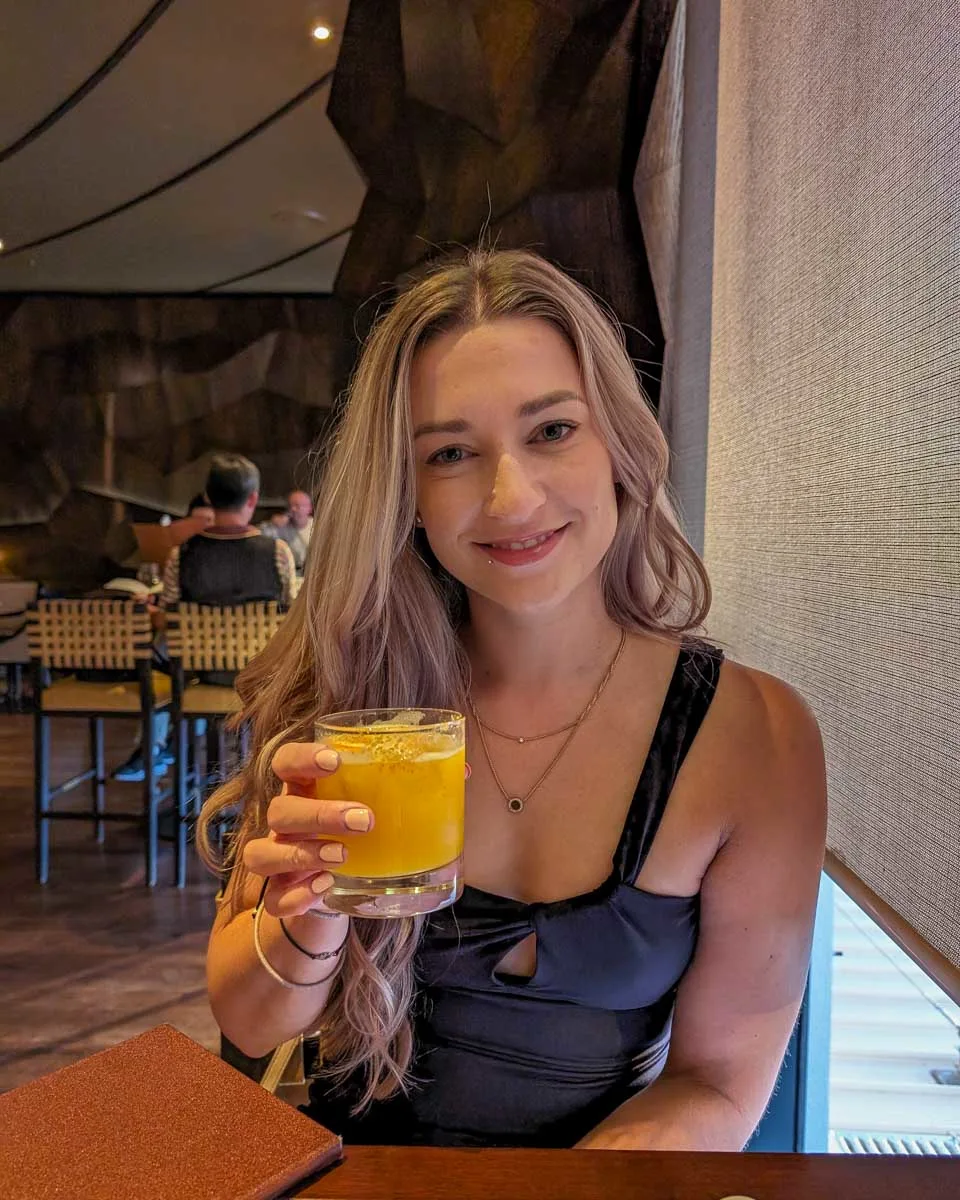 Bailey-enjoys-a-cocktail-out-for-dinner-in-Brisbane