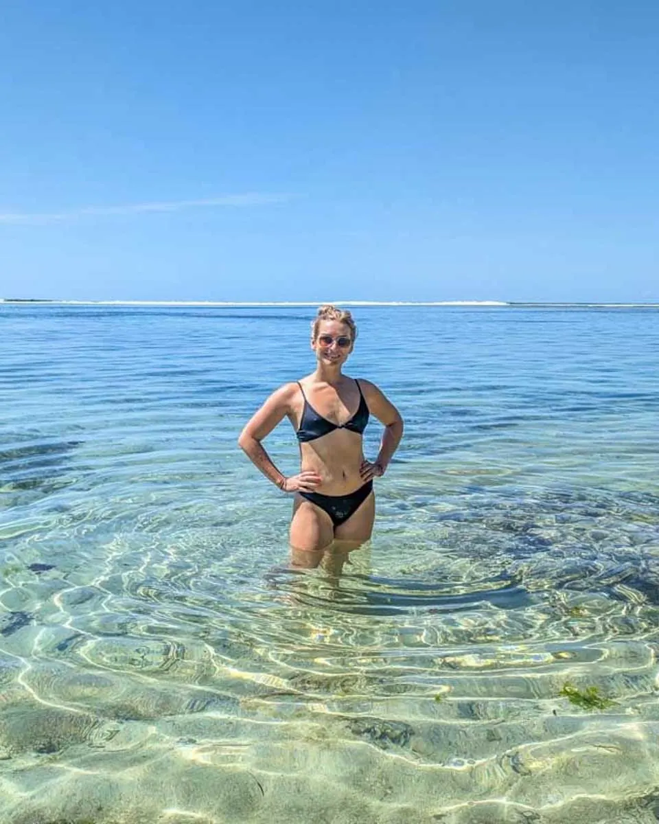 Bailey-poses-for-a-photo-at-a-beach-in-Martinique