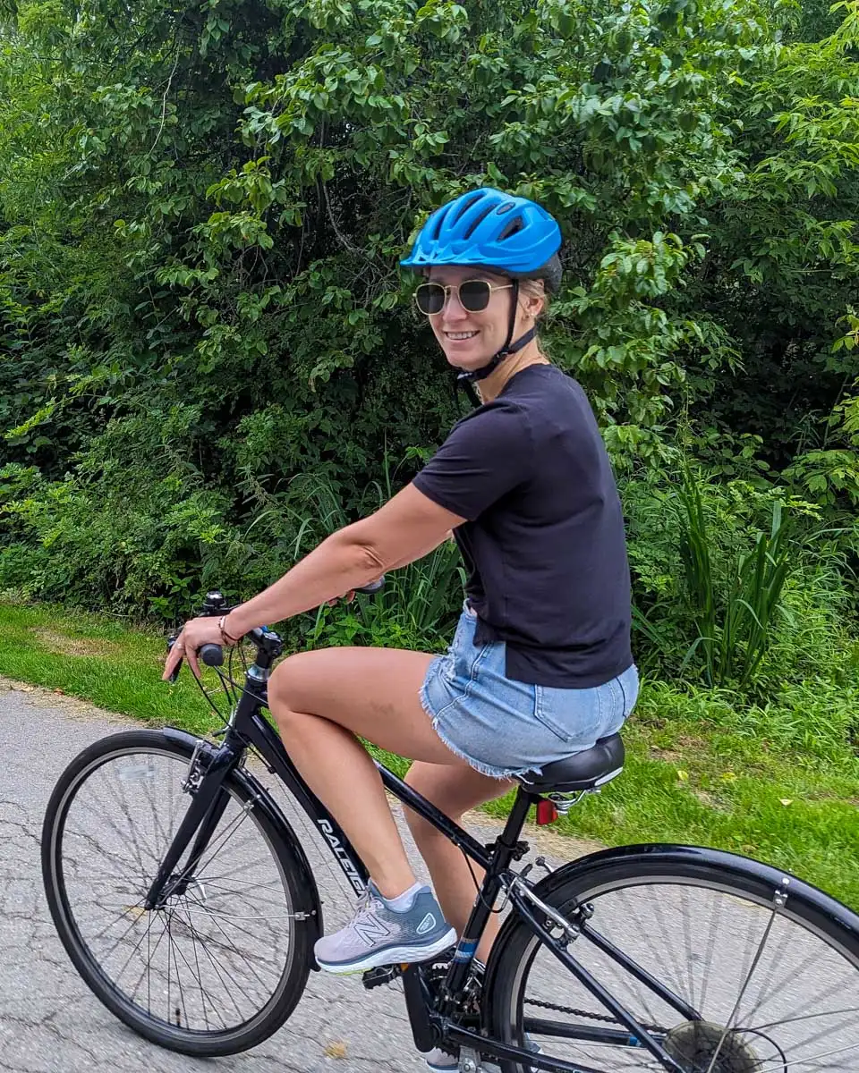 Bailey rides a bike on a wine tour from Adelaide