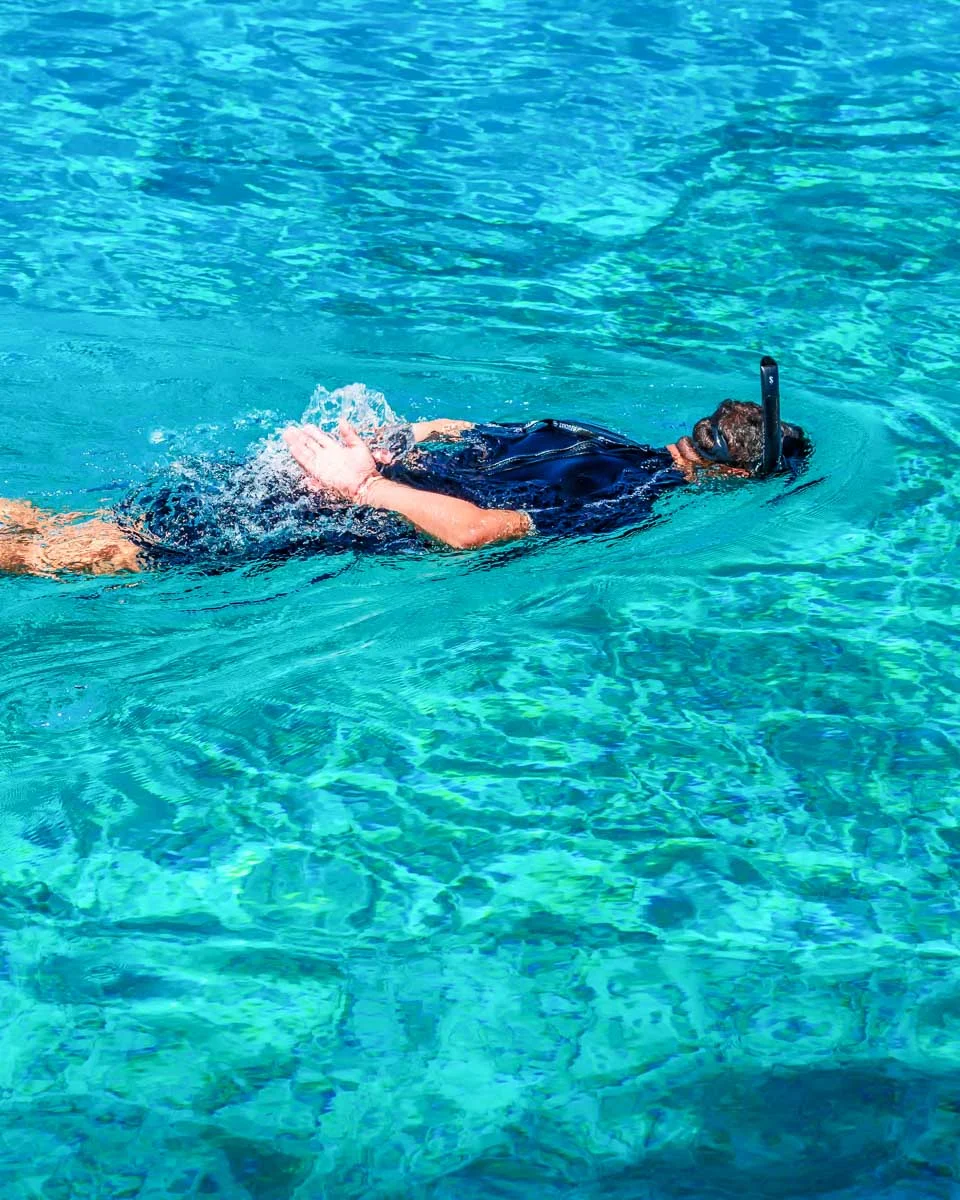 Daniel-snorkels-in-the-water-of- Antigua and Barbuda on a full day tour