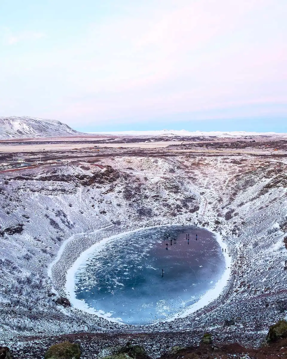 The beautiful Kerid crater covered in snow in Iceland, Europe