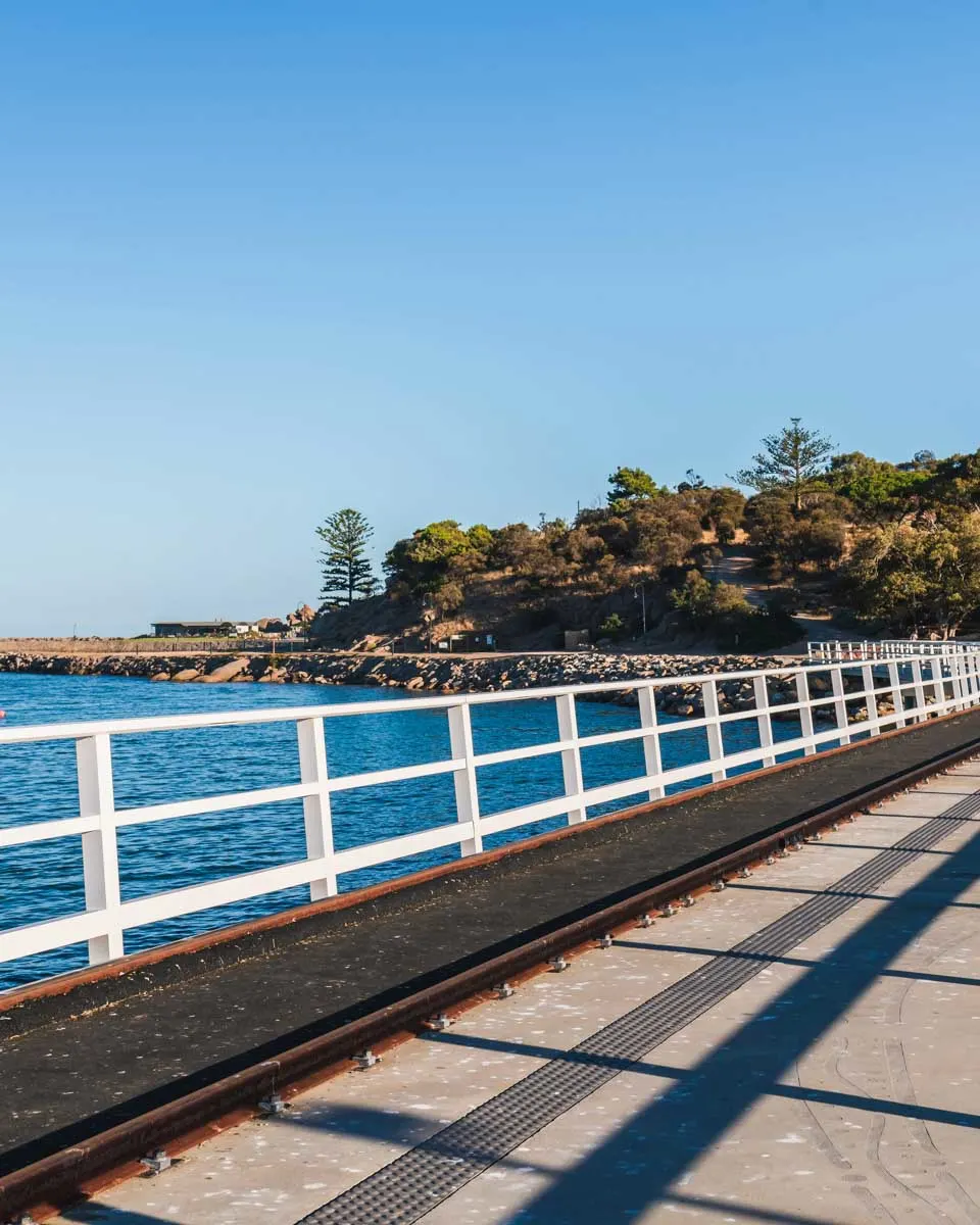 Walking along the causeway from Victor Harbor to Granite Island