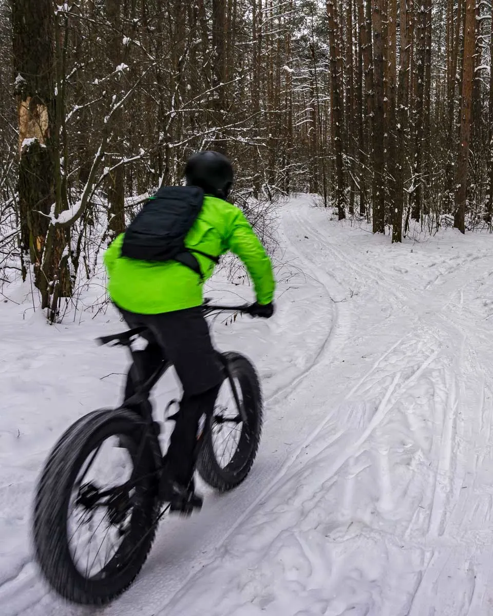 A person fat tire bikes in Jasper AB Canada