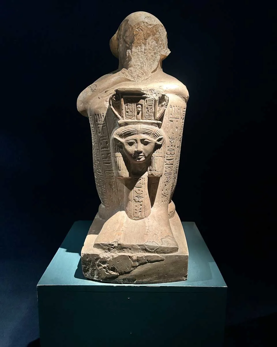A statue with hieroglyphic inscriptions seen in the Luxor Museum
