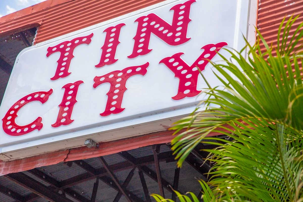 Tin City Sign at the Entrance Way in Naples, Florida