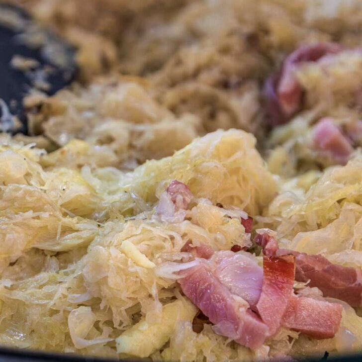 Traditional Alsacian choucroute garnie eaten on a winter food tour in Strasbourg France