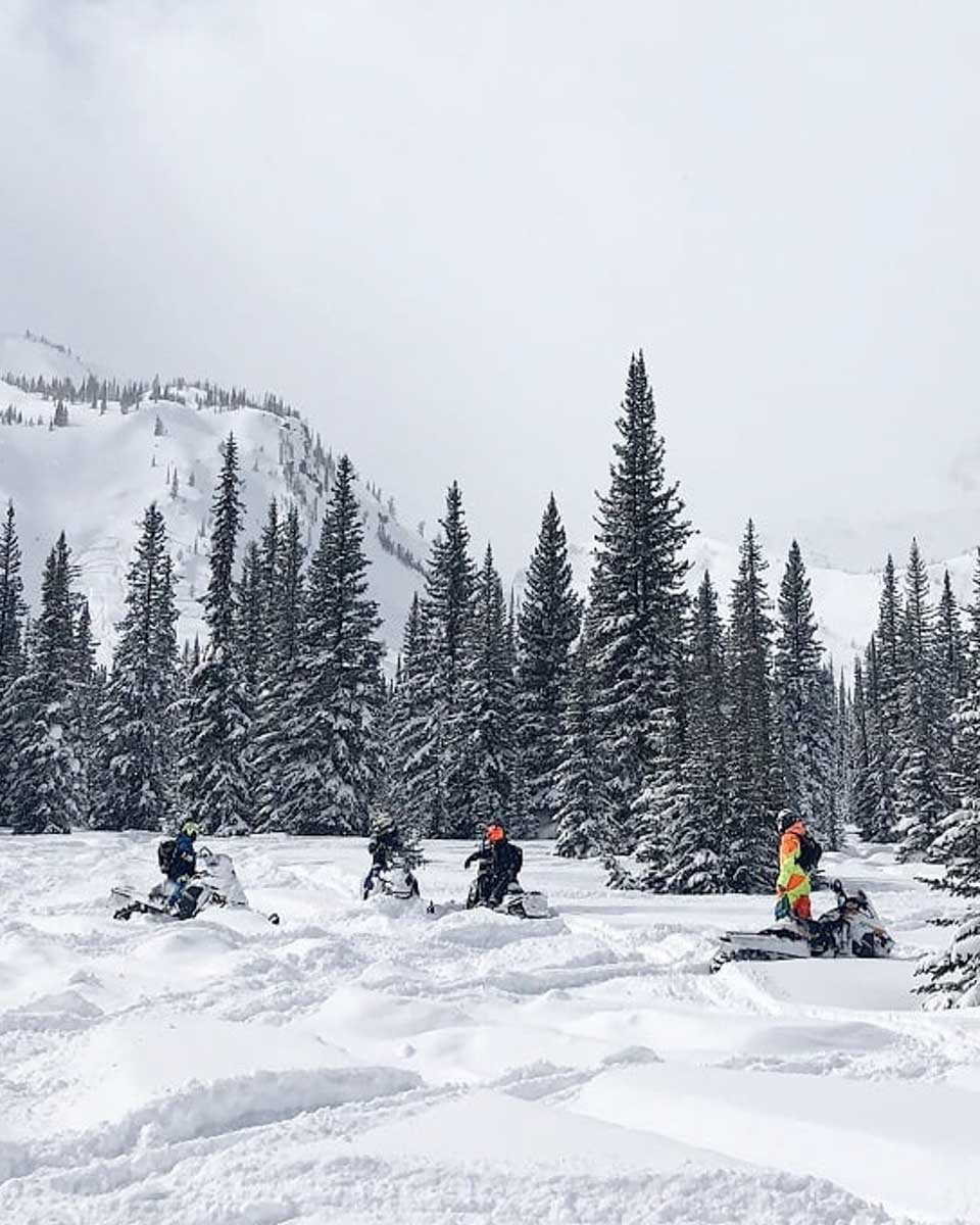 snowmobiling-in-whistler-Canada on a tour in winter