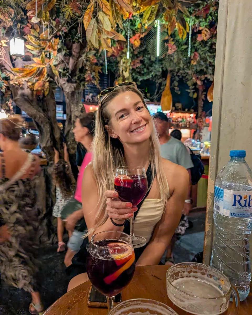 Bailey-holds-a-drink-cocktail-in Valencia-Spain-1