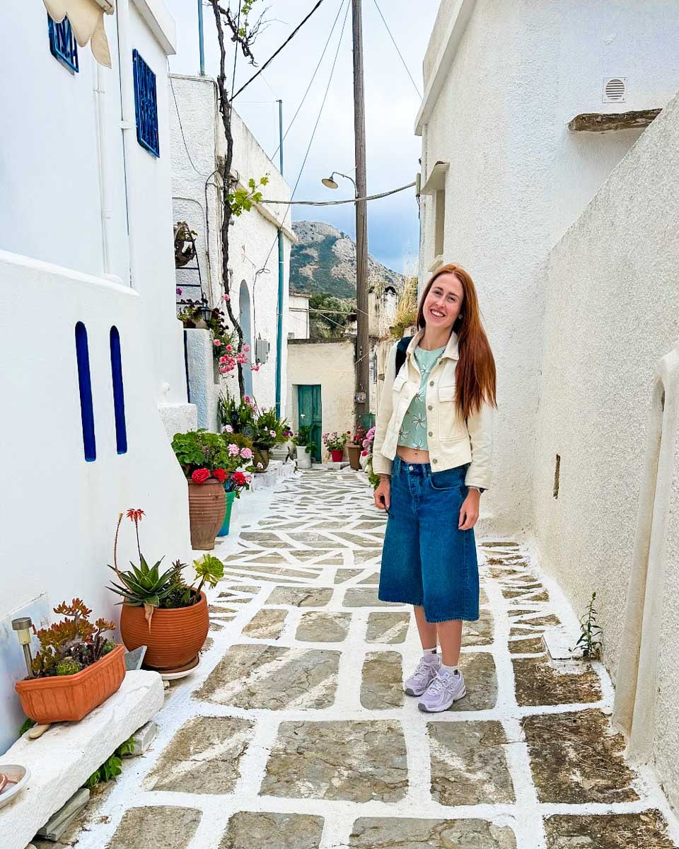 Hannah stands on a side street in Chora, Naxos
