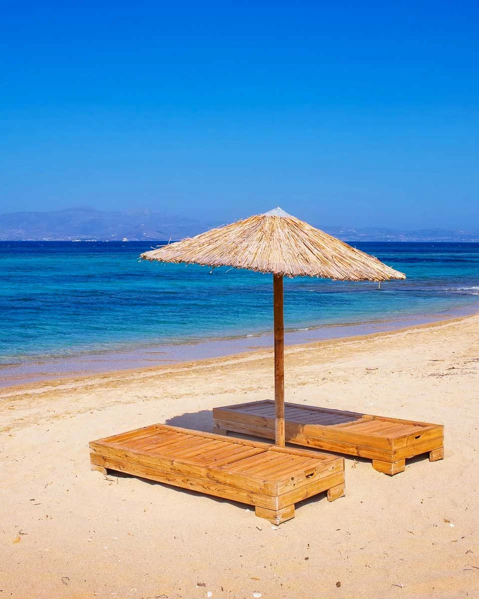 Sunbeds on Plaka beach, Naxos island, Greece (1)
