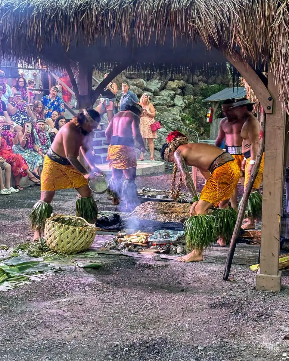 Men-prepare-food-at-a-Luau-in-North Shore Oahu