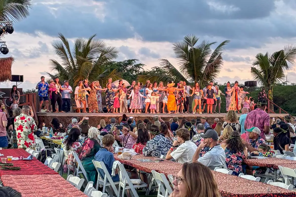 People on stage at a luau on Oahu Hawaii