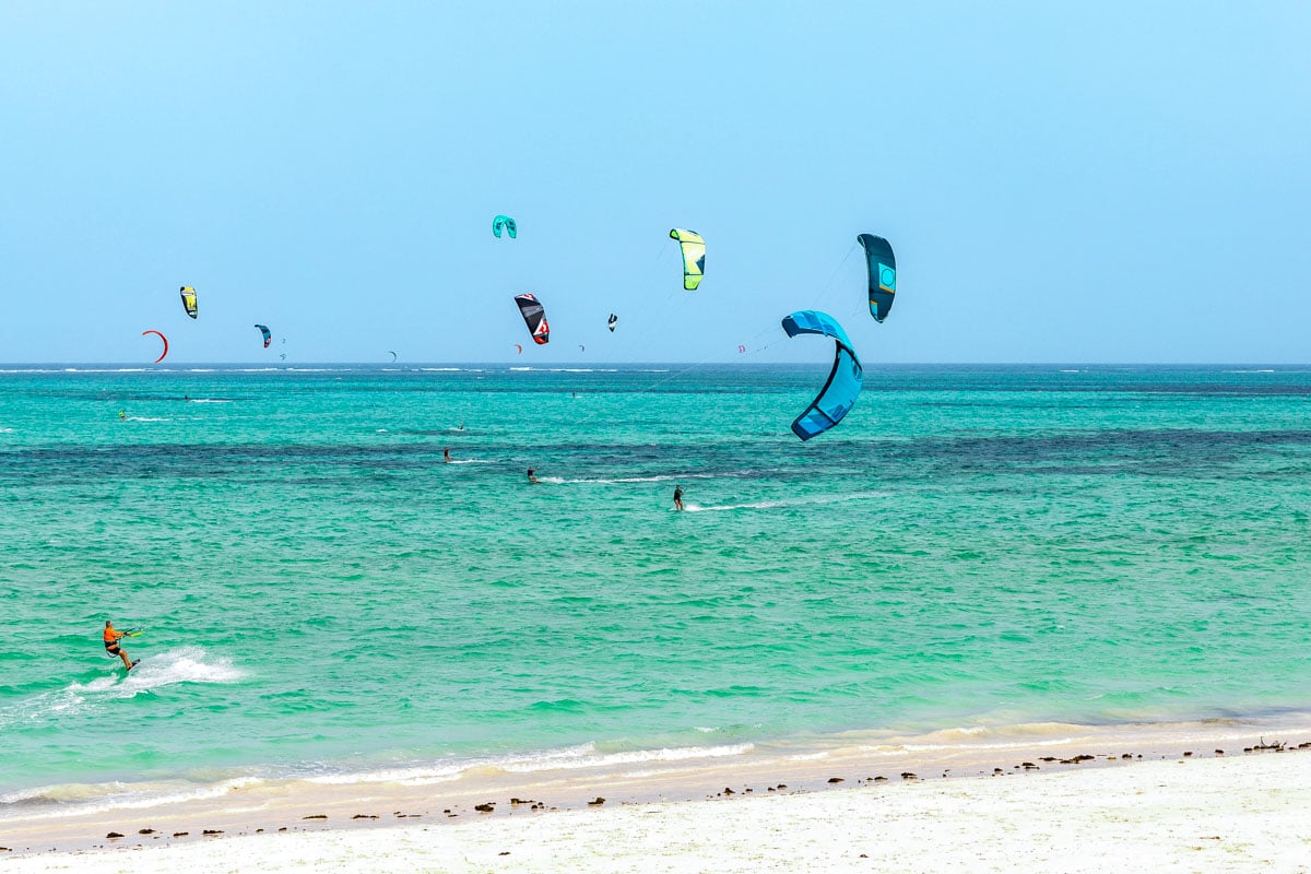 Kite surfing in ocean in Paje beach, Zanzibar, Tanzania