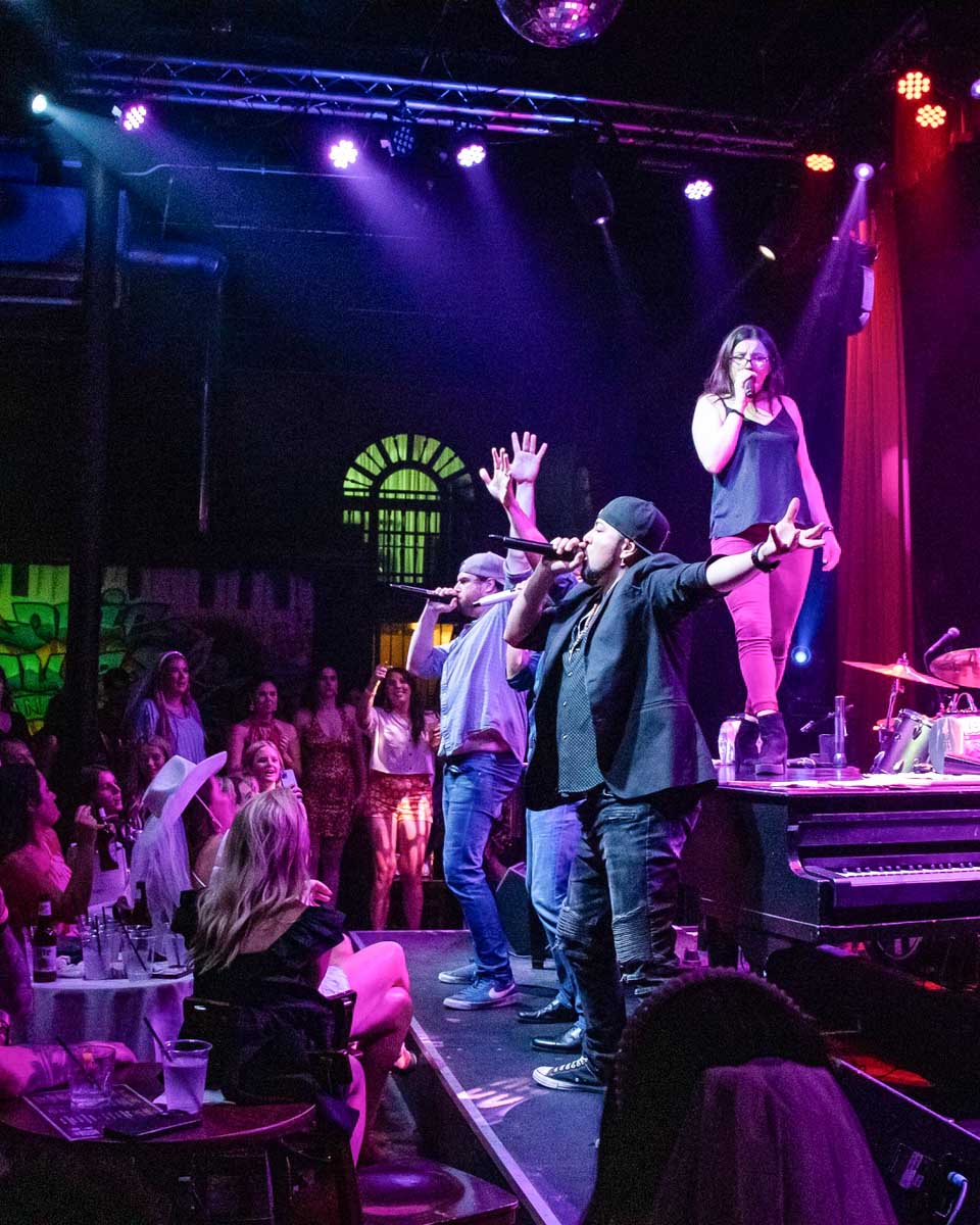 People party at Louie Louie’s Dueling Piano Bar in Dallas Texas