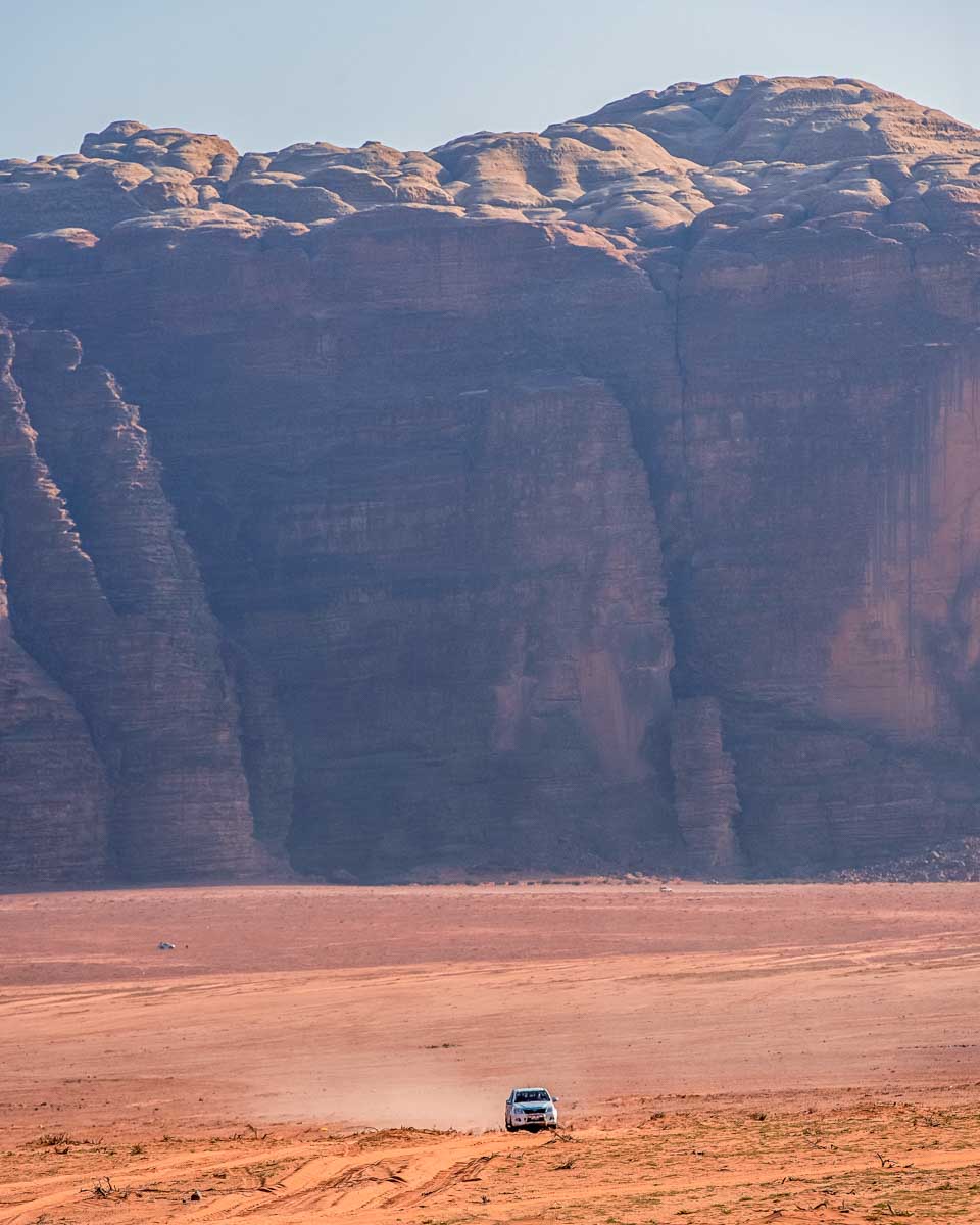 A-jeep-driving-through-the-Wadi-Rum-desert