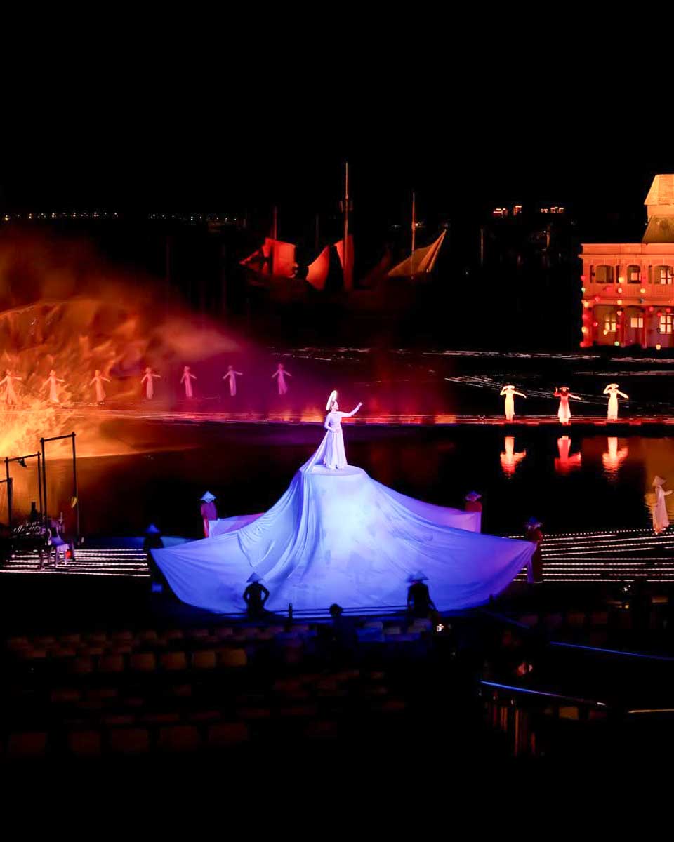 A woman performs at the Memories show in Hoi An, Vietnam