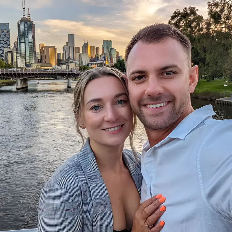 Bailey-and-daniel-smile-for-a-selfie-on-the-deck-of-the-spirit-of-melbourne-dinner-cruise on a get your guide tour