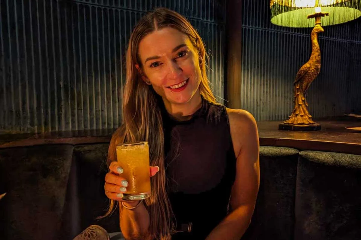Bailey-drinks-a-cocktail-in-Grand Cayman