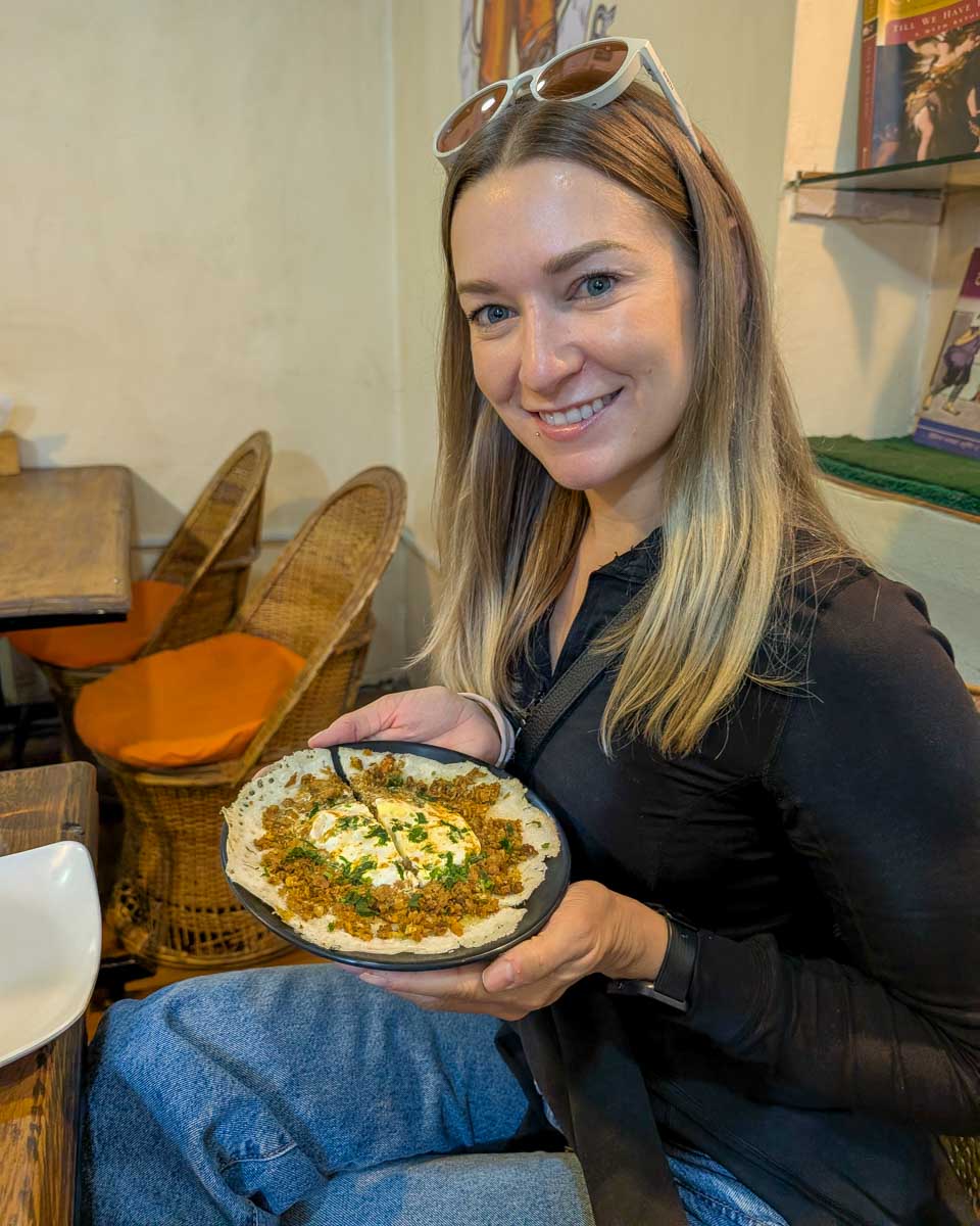 Bailey eating Neaplese food on a food tour in Kathmandu Nepal (1)