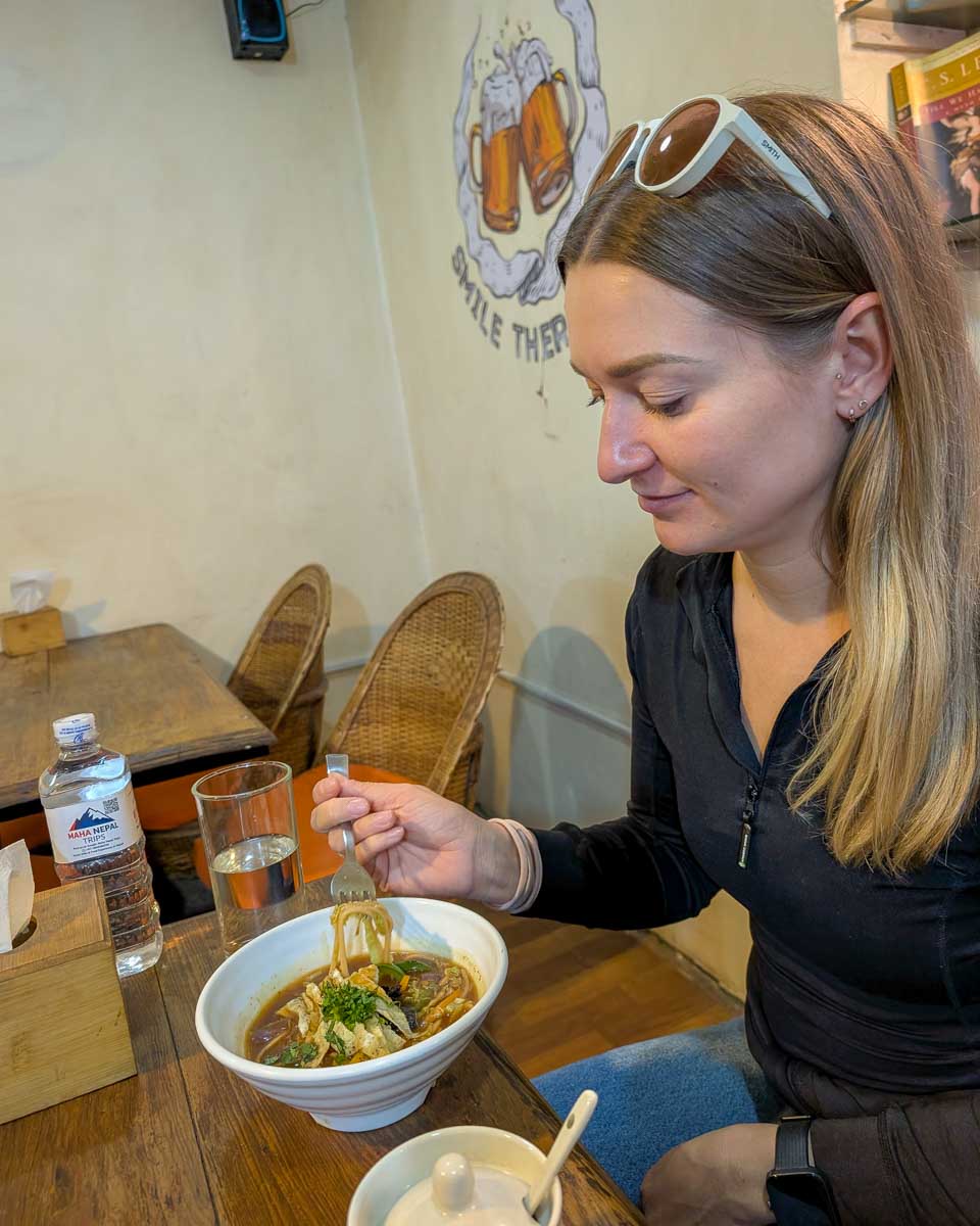 Bailey eating Neaplese food on a food tour in Kathmandu Nepal (2)