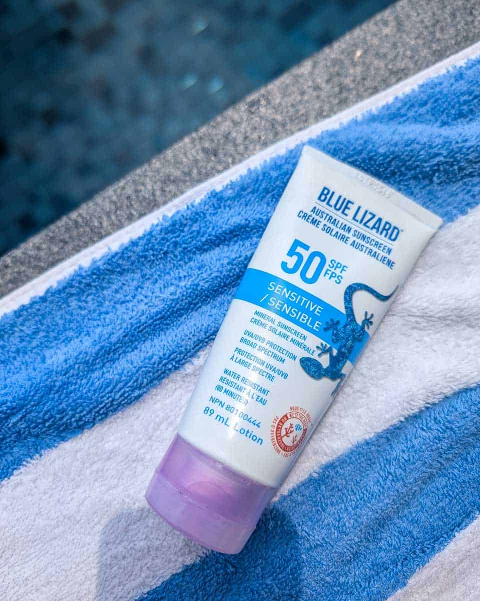 Bailey-holds-Blue-Lizard-sunscreen-1