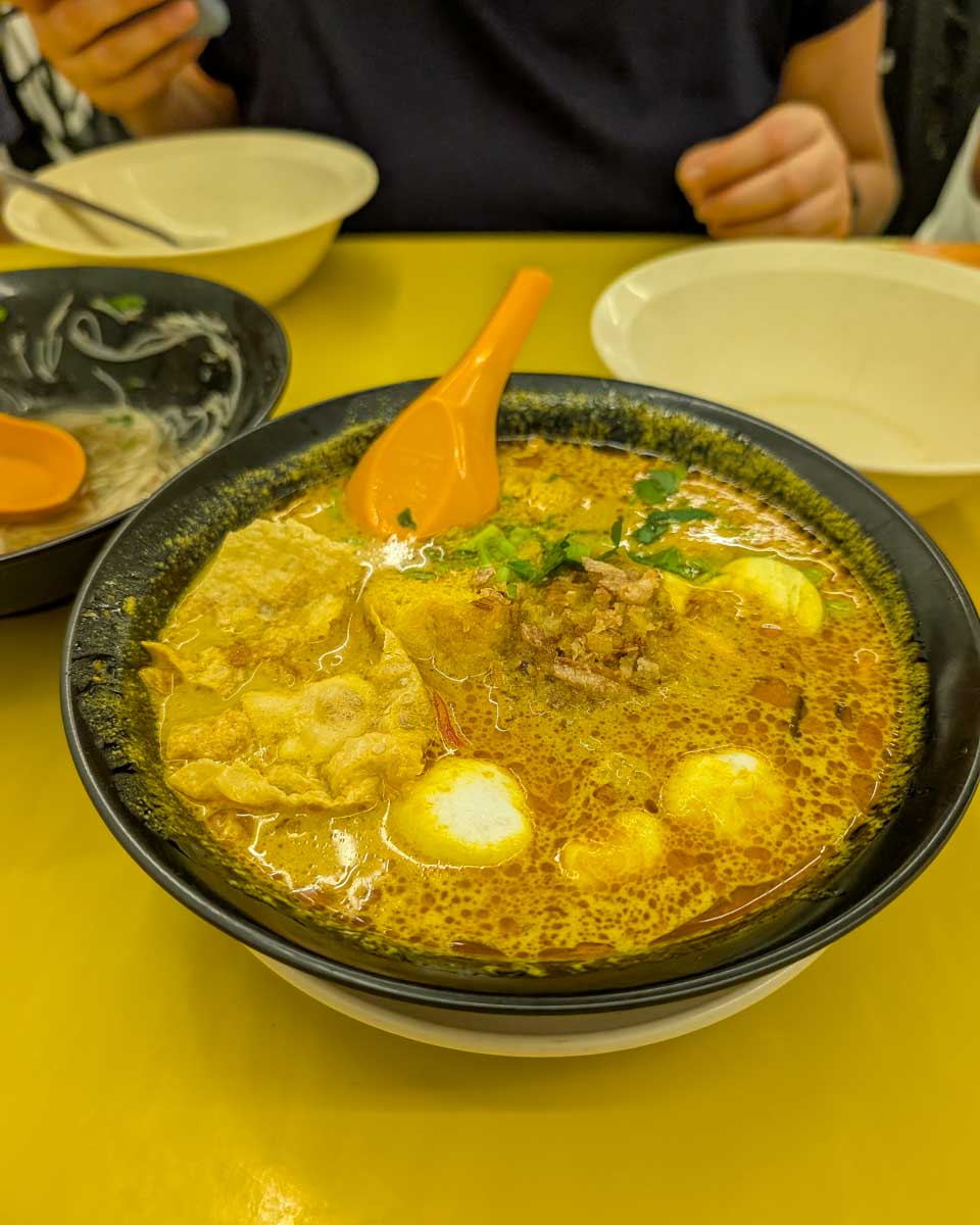 Curry laksa eaten on a food tour in Kuala Lumpur Malaysia