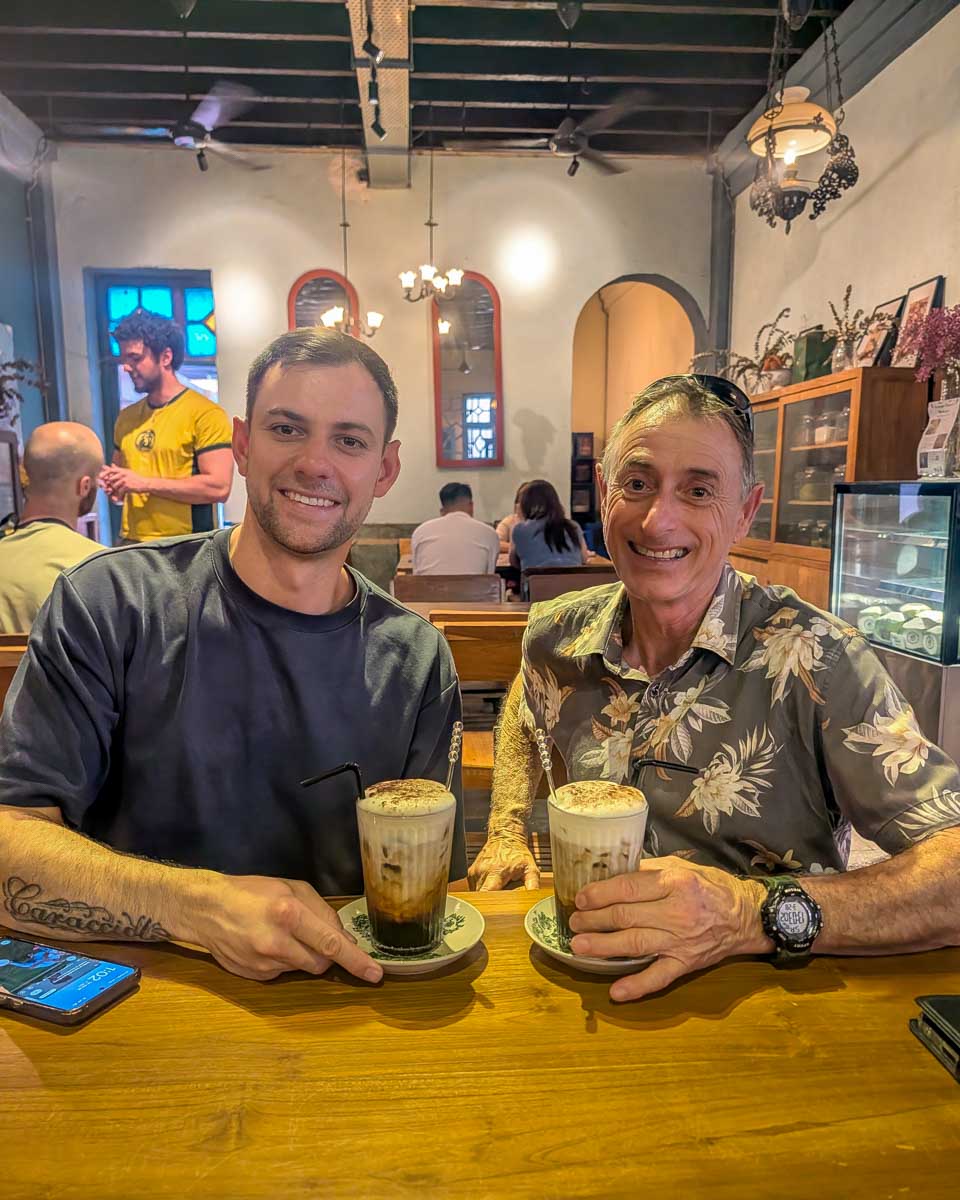 Daniel and his dad drink Nyonya coffee at Limapulo Terrace in Kuala Lumpur Malaysia(2)