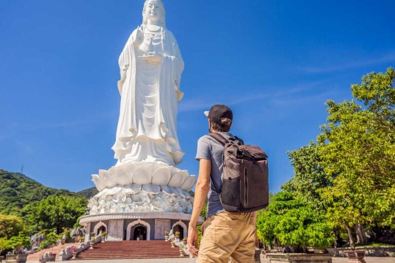 Man tourist in Chua Linh Ung Bai But Temple Vietnam