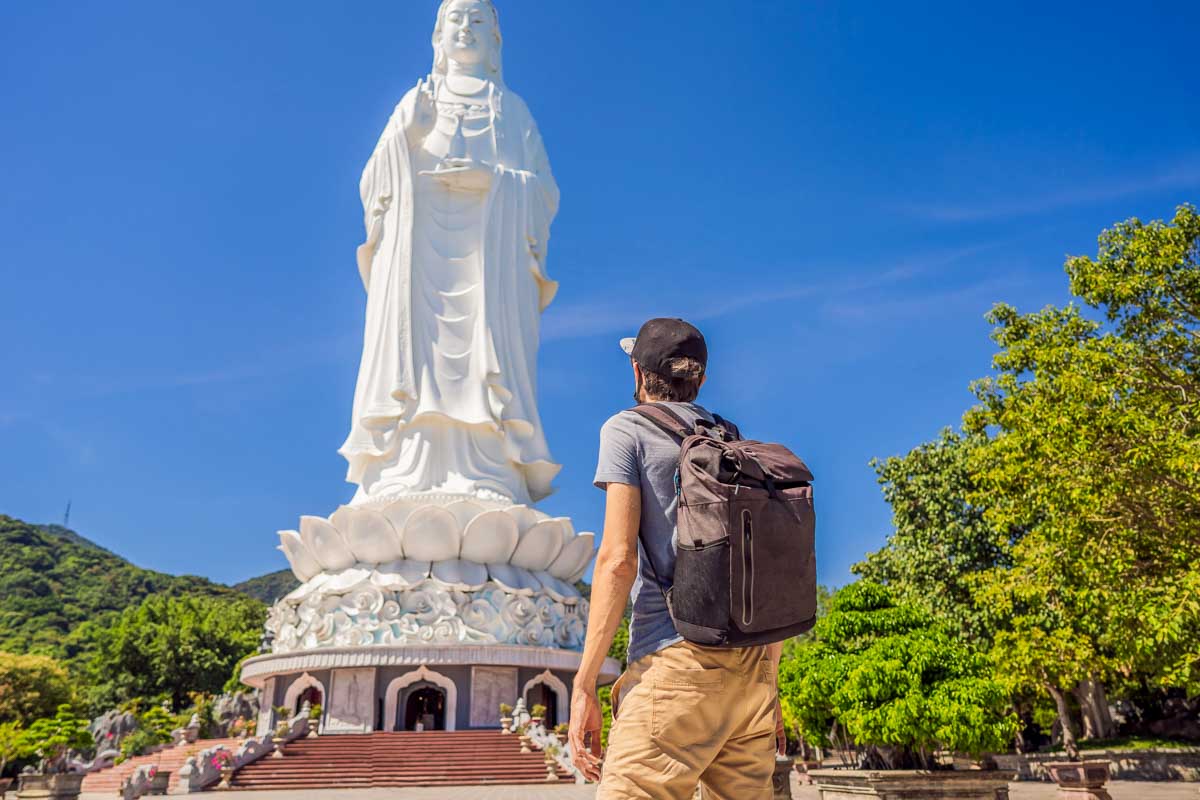 Man tourist in Chua Linh Ung Bai But Temple Vietnam