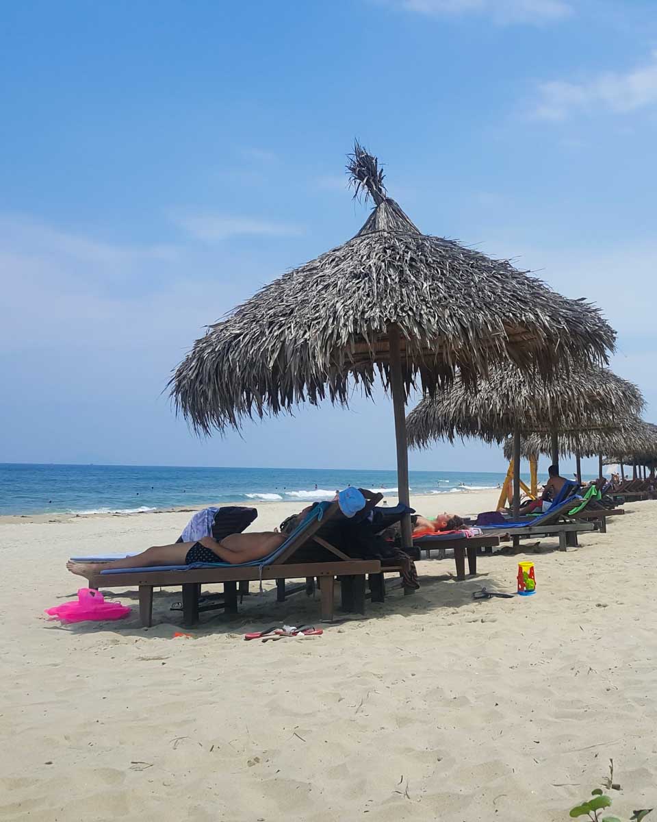 People relax on An Bang Beach in Hoi An, Vieetnam