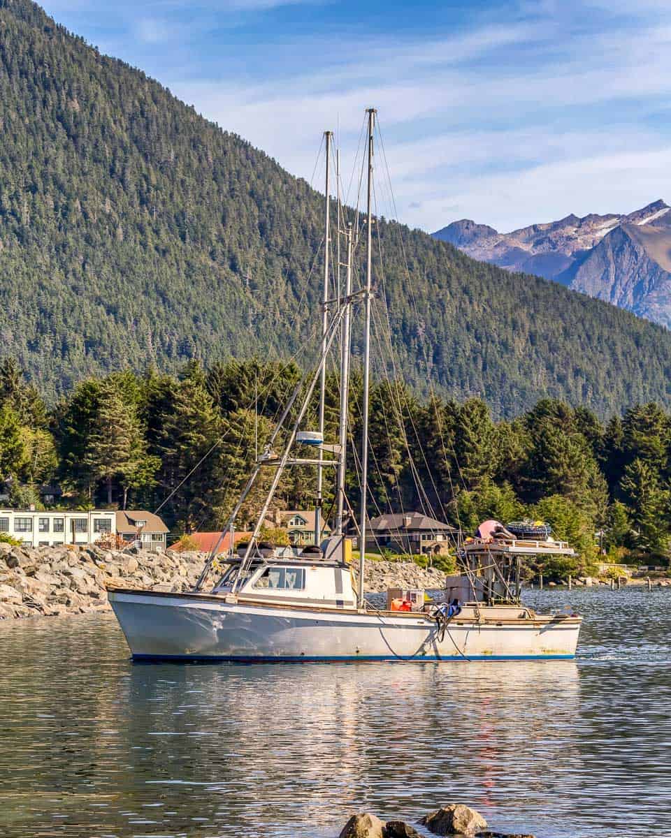 Shot of a fishing boat sailing in a harbour in Sitka Alaska