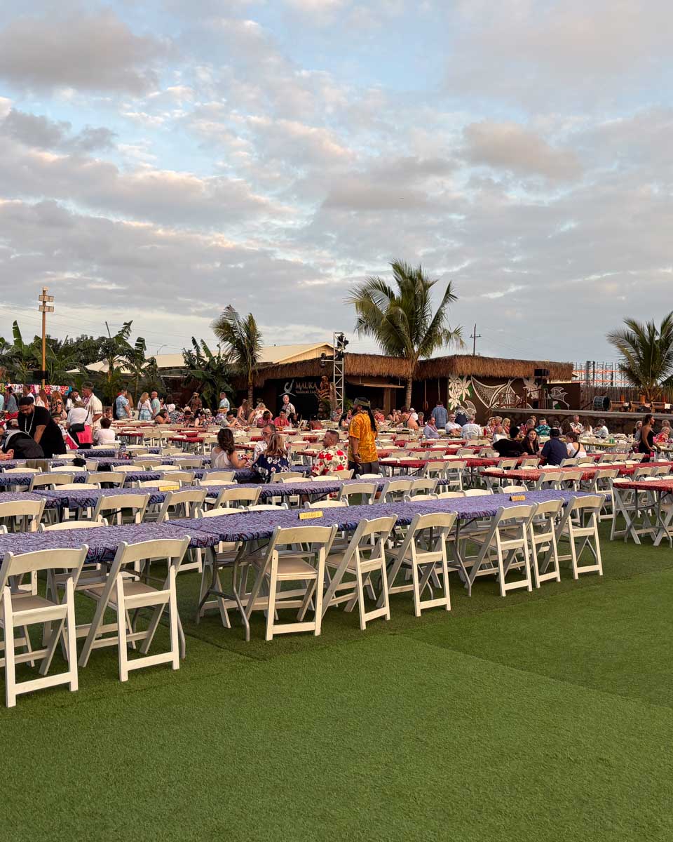 Tables set up on the beach during a luau in Hawaii Maui
