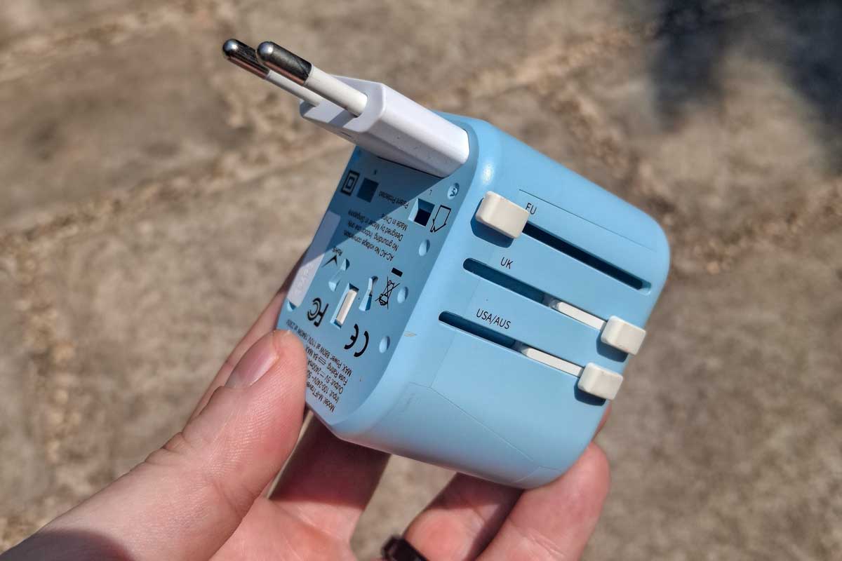 Travel adaptor for packing list