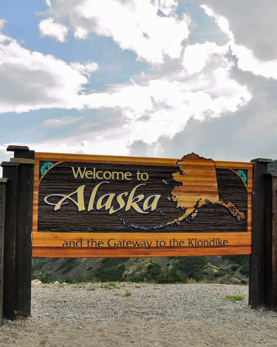 Welcome to Alaska sign seen on a tour from Skagway Alaska