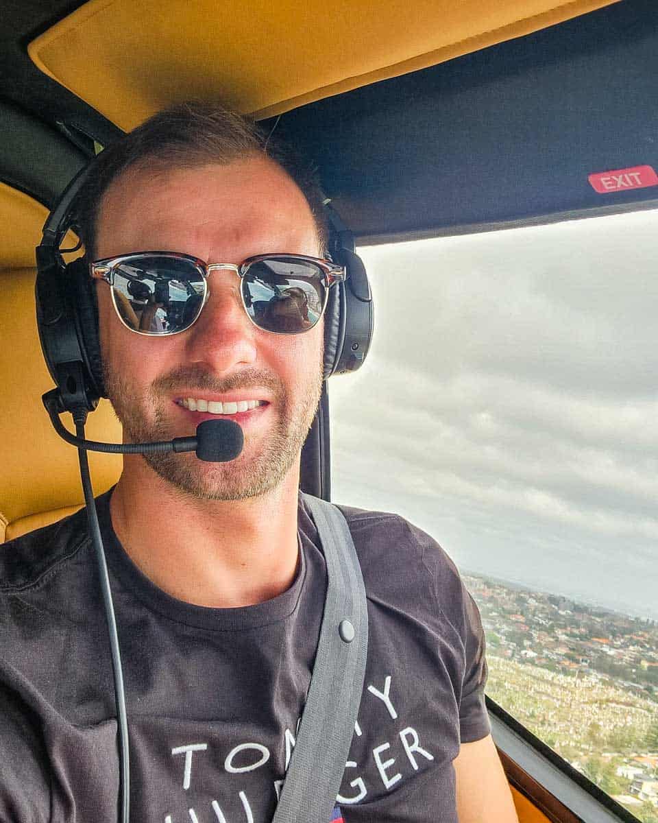 Daniel-takes-a-selfie-while-flying-in-a-helicopter-over-Maui Hawaii
