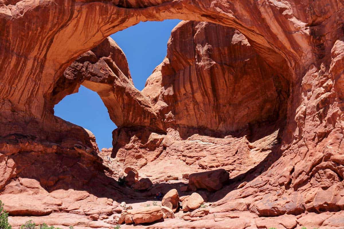Looking at Double Arch in Arches National Park in Utah on a tour from Moab