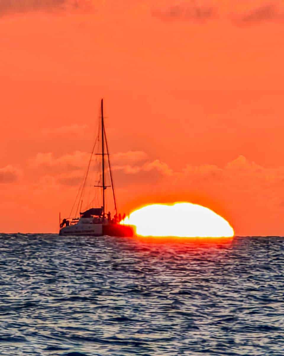 A catamaran seen at sunset in Moorea