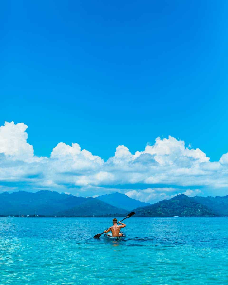A man in a transparent kayak in Moorea 1