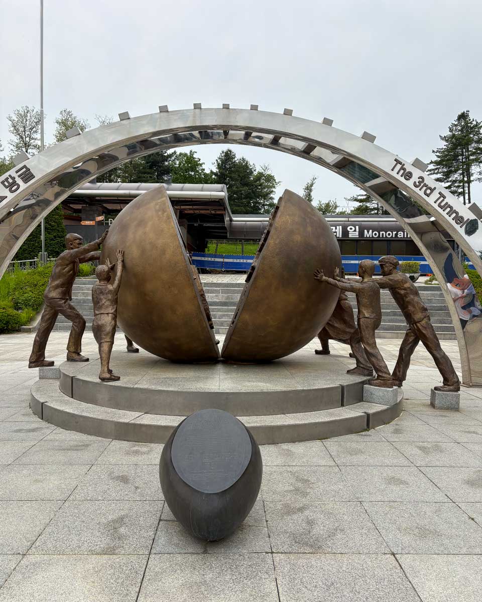 A monument for the reunification of Korea at the 3rd Infiltration Tunnel on a DMZ tour from Seoul South Korea